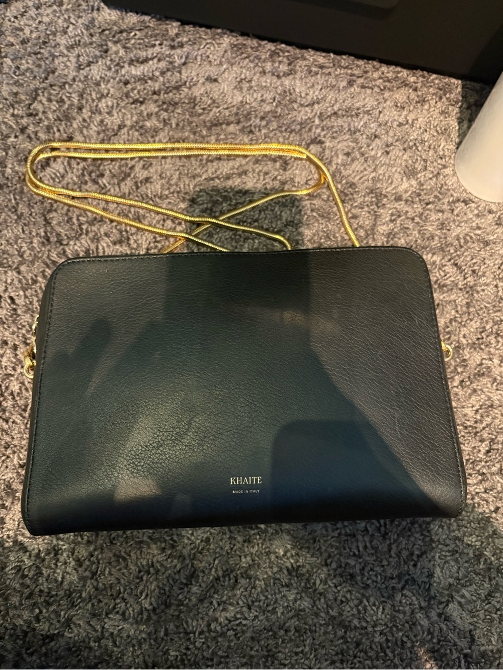 KHAITE Black Leather Crossbody with Gold Chain